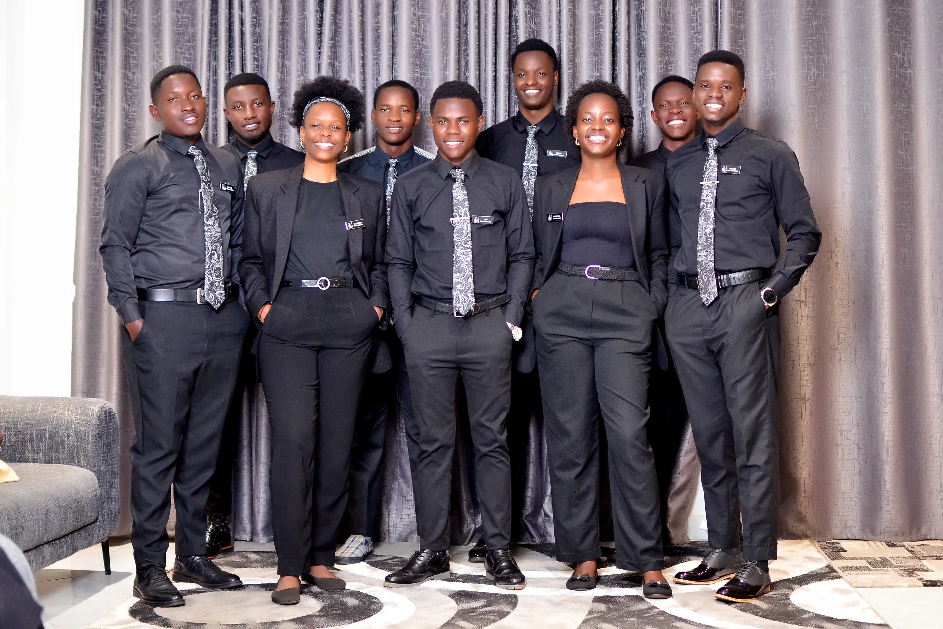 Summit Protocol team in formal black uniforms