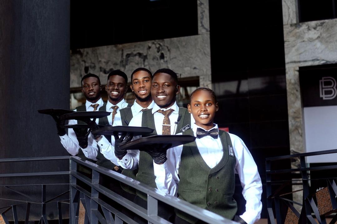 Summit Protocol team standing at an event venue